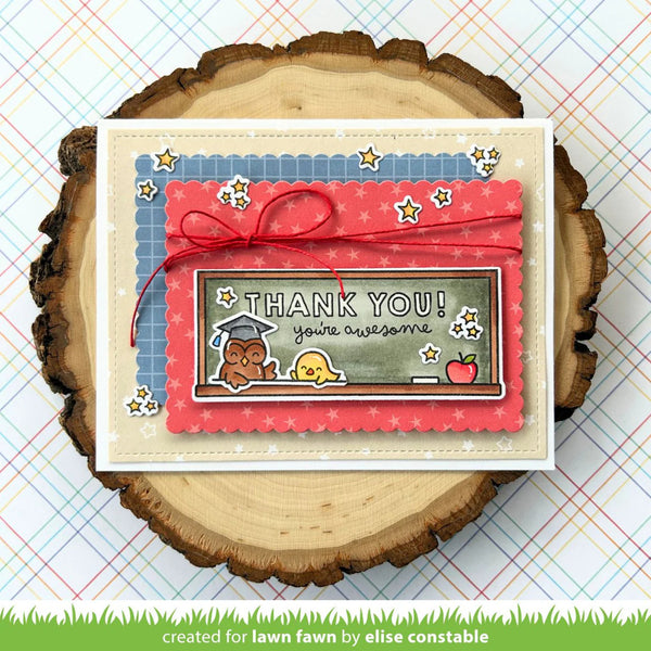 Card with 'Thank you! You're awesome' message on a wooden surface