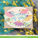 Greeting card with floral design and 'thinking of you' text, surrounded by yellow flowers.