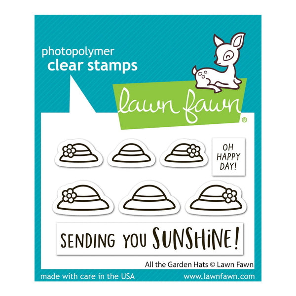 Lawn Fawn photopolymer clear stamps with garden hats and text on a blue background