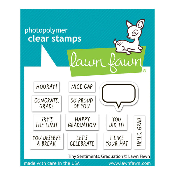Lawn Fawn photopolymer clear stamps set with graduation-themed phrases and a deer illustration on a blue and white background.