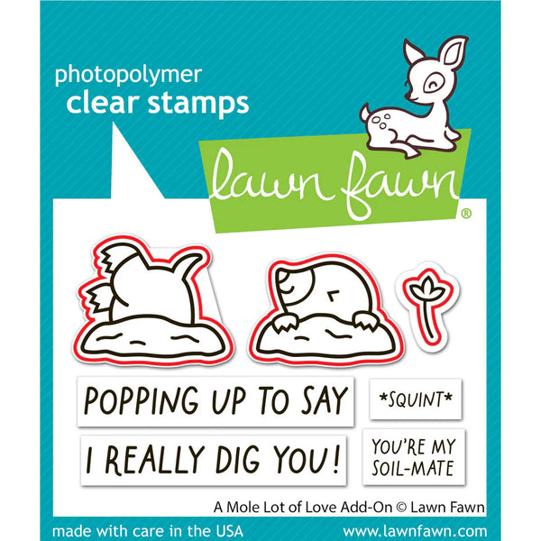Lawn Fawn photopolymer clear stamps with cartoon moles and text on a blue background