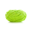 Neon green ball of yarn on a white background
