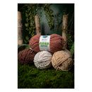 Three skeins of yarn in brown, beige, and white with a 'Posh Twist' label on a natural background.