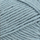 Close-up of light blue yarn with a textured pattern