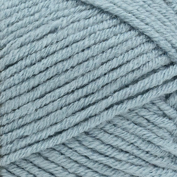 Close-up of light blue yarn with a textured pattern