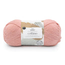 Ball of pink yarn with a label on a white background