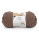 Brown skein of yarn with a label on a white background