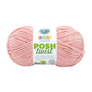 Pink yarn ball with a label on a white background