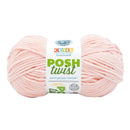 Ball of pink yarn with a label on a white background