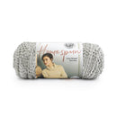 Ball of gray yarn with a label on a white background
