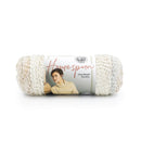Ball of yarn with a label featuring a person wearing a knitted sweater on a white background