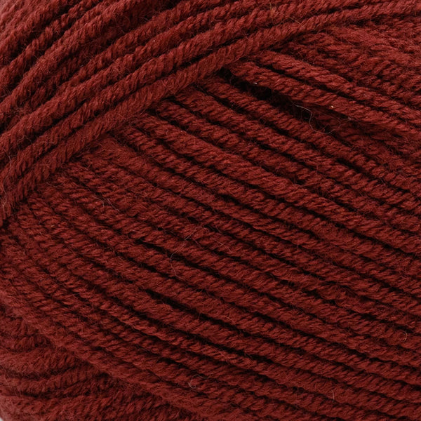 Close-up of a ball of dark red yarn