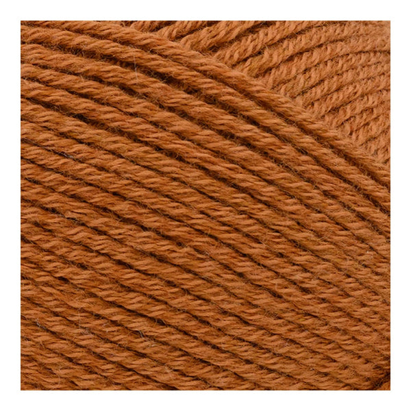 Close-up of brown yarn with a plain background