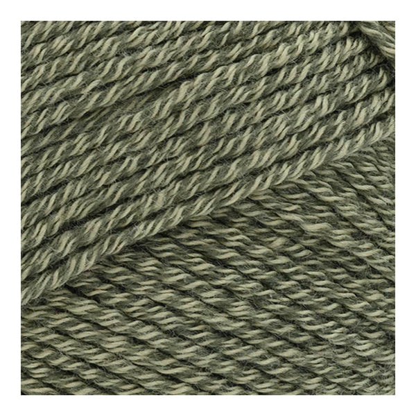 Close-up of green yarn with a textured pattern