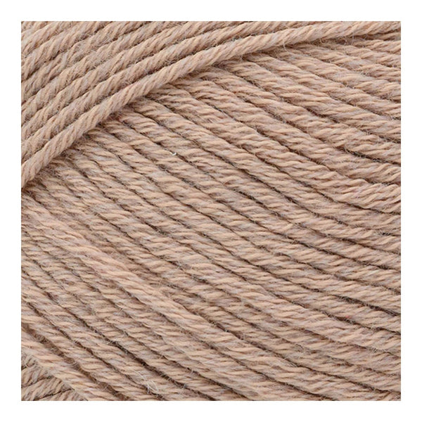 Close-up of beige yarn with a textured pattern