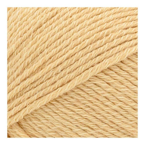 Close-up of beige yarn with a diagonal pattern