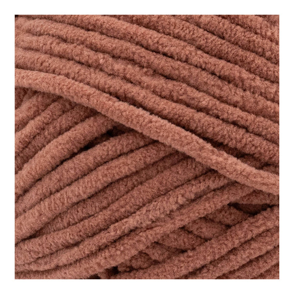 Close-up of brown yarn with visible texture