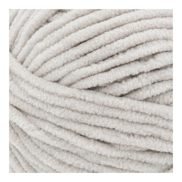 Close-up of a ball of light gray yarn
