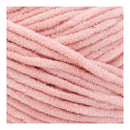 Close-up of pink yarn with a soft texture