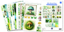 Collection of art journaling and card making supplies with nature-themed designs.