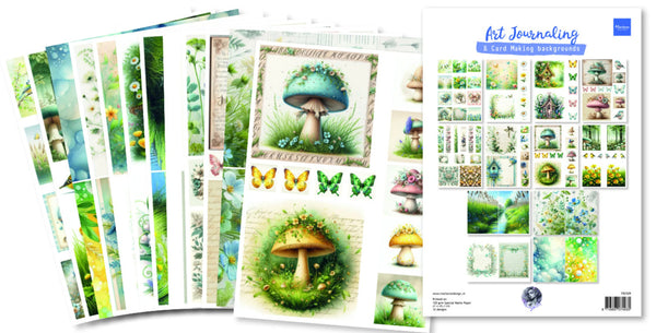 Collection of art journaling and card making supplies with nature-themed designs.