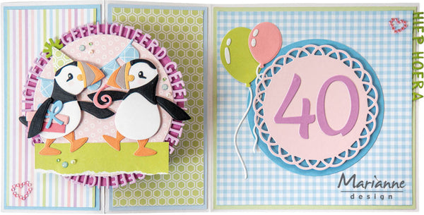 Two decorative cards with penguins and a number 40, featuring Marianne Design branding.
