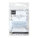 Bakers twine package with decorative label on a white background