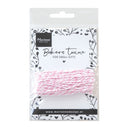 Packaged bakers twine with pink and white strands on a decorative label.