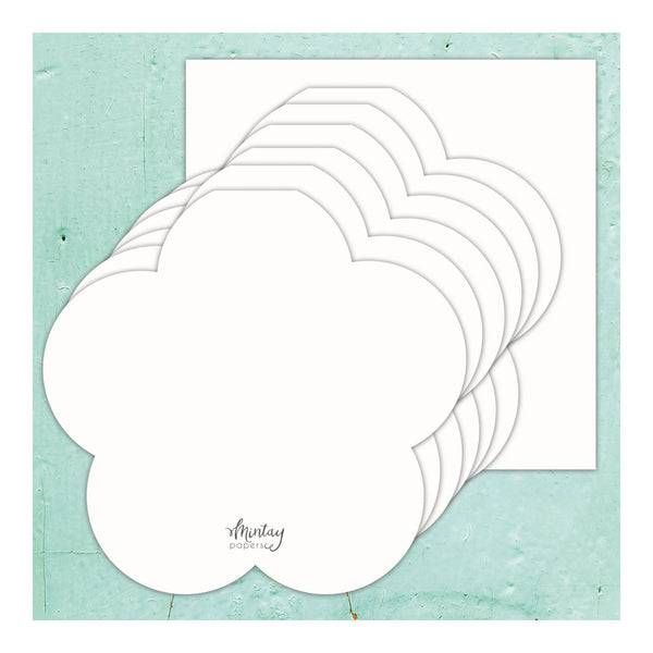 Set of white paper circles on a light blue textured background