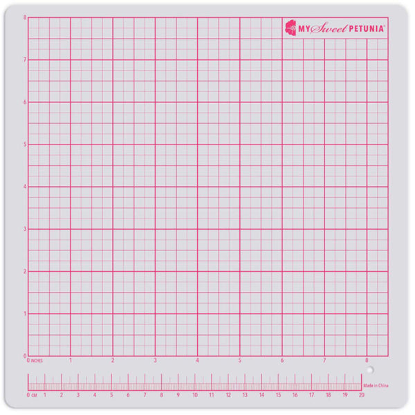 Grid cutting mat with red lines and 'My Sweet Petunia' branding on a white background