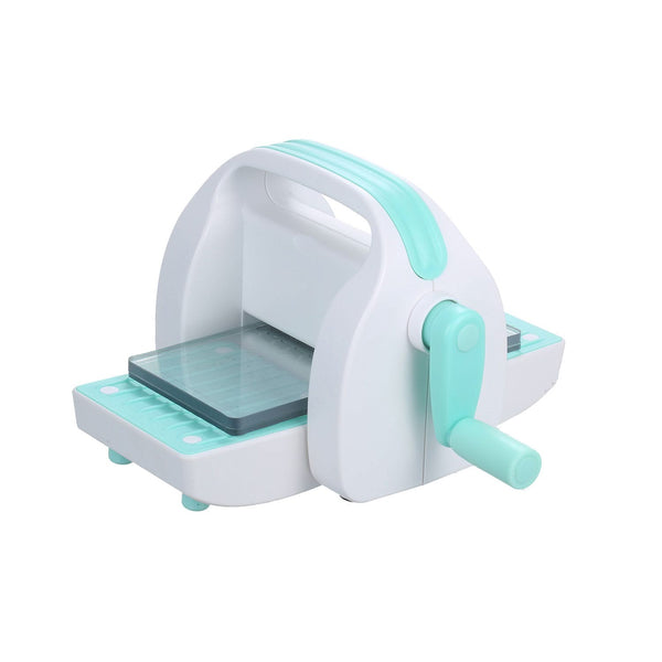 White and turquoise die cutting and embossing machine on a white background