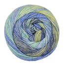 Multicolored yarn ball with blue, green, and yellow hues on a white background
