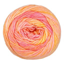 Ball of yarn with pink and orange gradient on a white background