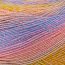 Close-up of multicolored yarn with pink, blue, and yellow hues.