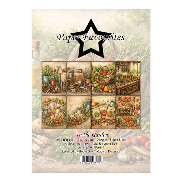 Pack of paper with 'In the Garden' theme featuring illustrations of garden scenes and vegetables.