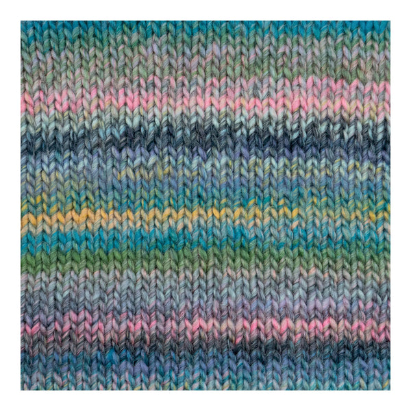 A close-up of a knitted fabric swatch showing horizontal stripes of blue, teal, green, pink, and yellow yarn in a textured knit pattern.