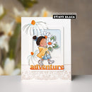 Card with a girl holding flowers and the word 'adventure' on a blurred floral background, featuring Penny Black branding.