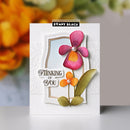 Greeting card with flowers and 'Thinking of You' text, featuring Penny Black brand.