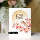 Card with a bird and flowers design and 'Penny Black' branding.