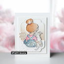 Card with a girl holding a lamb and text 'Always near, always dear' by Penny Black on a blurred floral background.