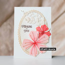 Greeting card with floral design and 'Thinking of You' text, featuring Penny Black brand.