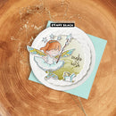 Card with fairy design and 'make a wish' text on a wooden surface, featuring Penny Black brand.