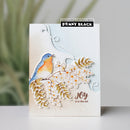 Card with a bird and floral design, featuring Penny Black branding.