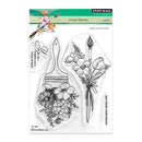 Clear stamp set with floral and paintbrush designs on a white background