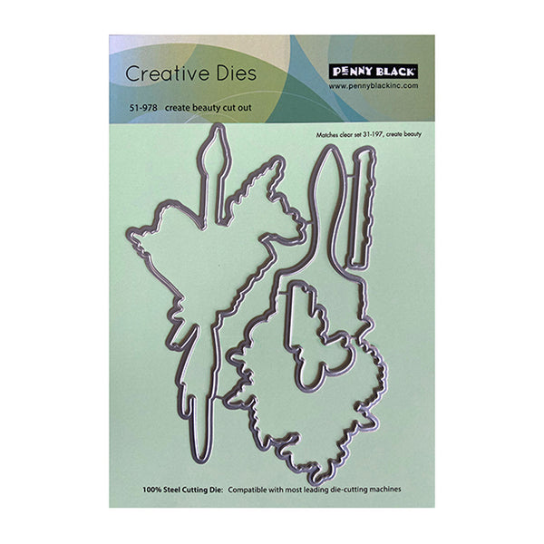Penny Black Creative Dies with butterfly and flower shapes on a green cardstock background