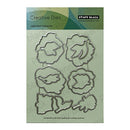 Penny Black Creative Dies with leaf and flower shapes on a green background