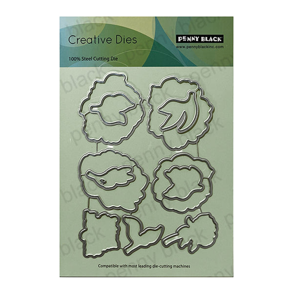 Penny Black Creative Dies with leaf and flower shapes on a green background
