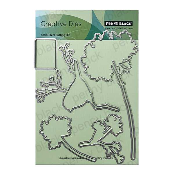 Penny Black Creative Dies with leaf and branch shapes on a green background