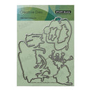Penny Black Creative Dies with metal cutouts on a green cardstock