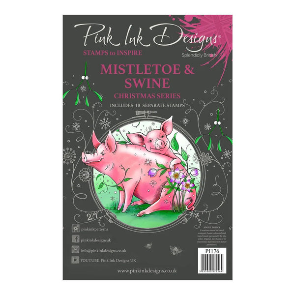 Pink Ink Designs stamp set packaging with two pigs and mistletoe design on a gray background